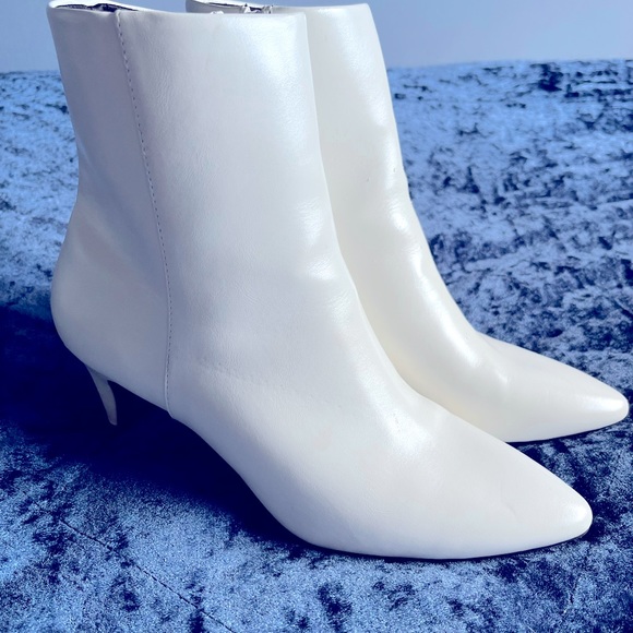 Mid-ankle, white booties. - Picture 3 of 7